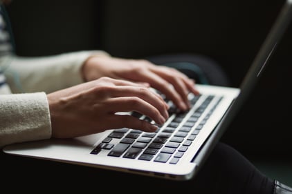 person using laptop